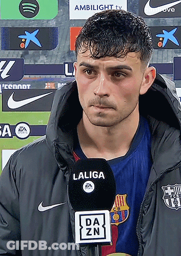 Man In Laliga Jacket Talking Into Microphone GIF
