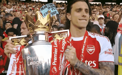 Man In Laliga Shirt Holding Trophy GIF
