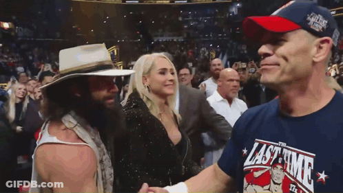 Man In Last Time Shirt Shakes Hands Woman GIF
