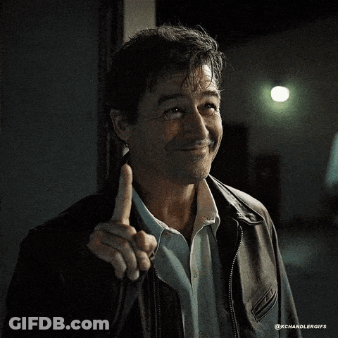 Man In Leather Jacket And Blue Shirt Giving Middle Finger GIF