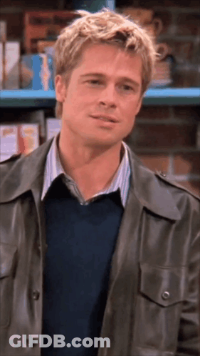 Man In Leather Jacket And Blue Sweater Smiling GIF