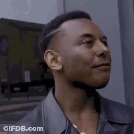 Man In Leather Jacket And Necklace GIF