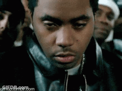 Man In Leather Jacket And Necklace GIF