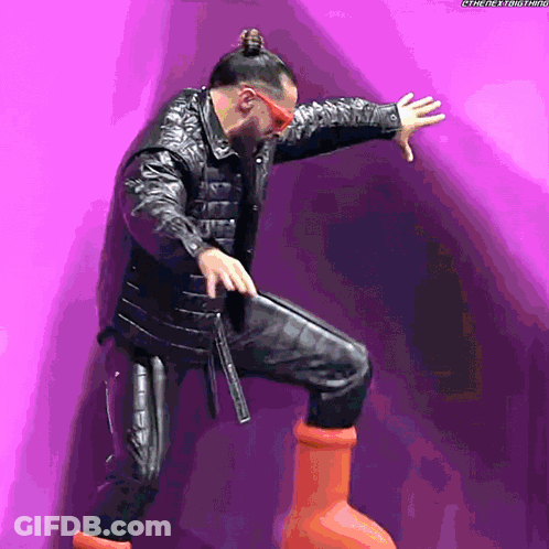 Man In Leather Jacket And Sunglasses On Pipe GIF