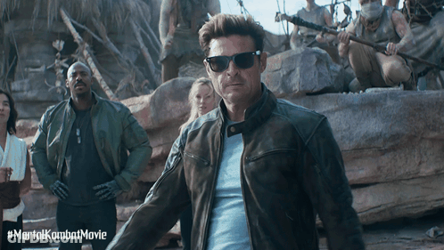Man In Leather Jacket And Sunglasses With Mortal Kombat Movie GIF