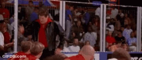 Man In Leather Jacket At Basketball Game GIF