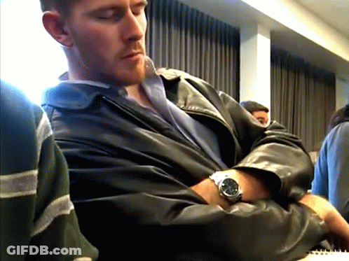 Man In Leather Jacket Eyes Closed With Watch GIF