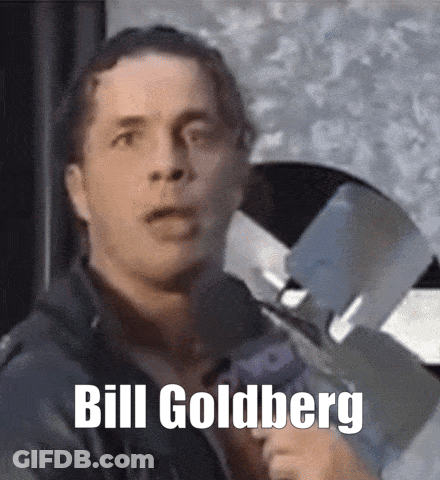 Man In Leather Jacket Holding Gun Says Bill Goldberg GIF