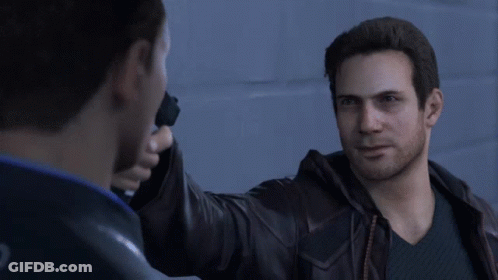 Man In Leather Jacket Holding Gun To Another Man GIF