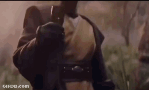Man In Leather Jacket Holding Gun GIF