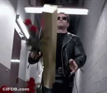 Man In Leather Jacket Holding Wooden Cross And Roses GIF