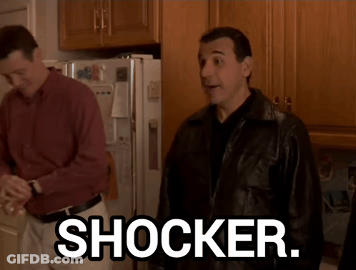 Man In Leather Jacket In Front Of Refrigerator Saying Shocker GIF