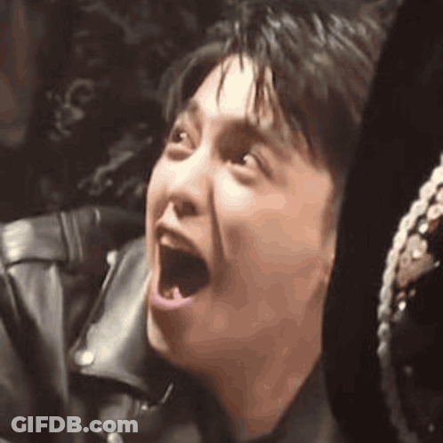 Man In Leather Jacket Making Funny Face GIF