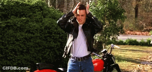 Man In Leather Jacket Next To Red Motorcycle GIF