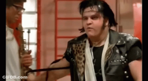 Man In Leather Jacket Next To Saxophonist GIF