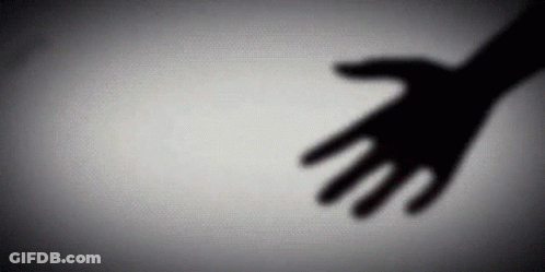 Man In Leather Jacket Playing Guitar In Desert GIF