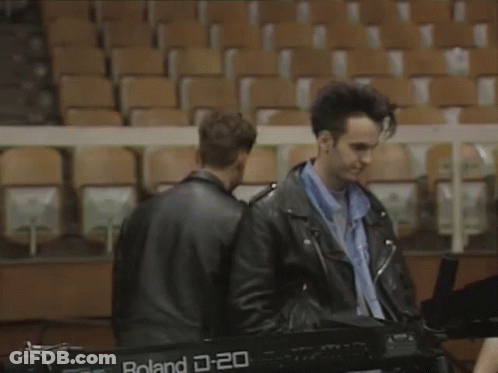Man In Leather Jacket Playing Roland Keyboard GIF