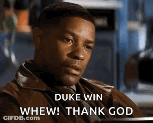 Man In Leather Jacket Saying Duke Win Whew GIF