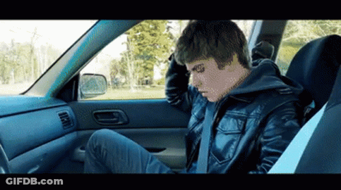 Man In Leather Jacket Sitting In Car GIF
