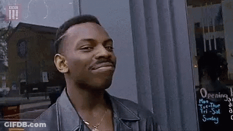 Man In Leather Jacket Smiling At Camera GIF