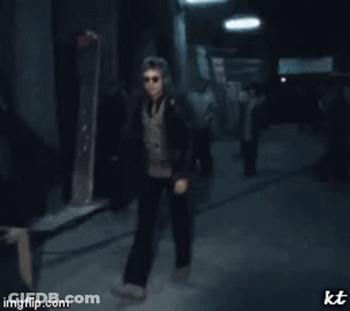 Man In Leather Jacket Standing GIF