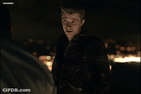 Man In Leather Jacket Talking To Another GIF