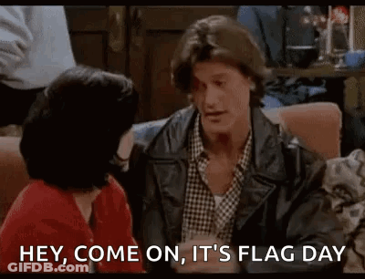 Man In Leather Jacket Talking To Woman GIF