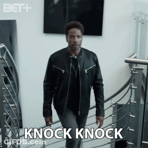 Man In Leather Jacket Walking Down Stairs GIF