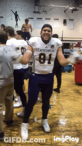 Man In Leathernecks Jersey Dancing In Gym GIF