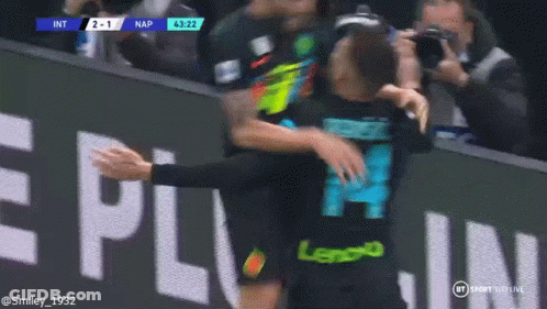 Man In Lenovo Jersey Hugging Another Man GIF