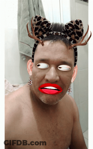 Man In Leopard Print Headband With Antlers GIF