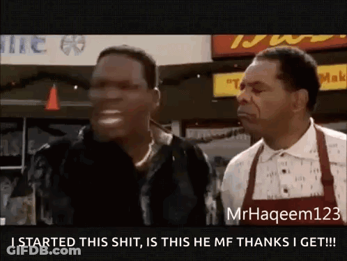 Man In Leopard Print Jacket Talking To Another Man GIF
