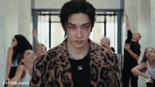 Man In Leopard Print Jacket With Fendi Necklace GIF