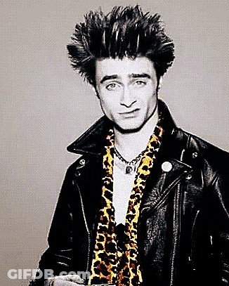 Man In Leopard Print Scarf And Black Leather Jacket GIF