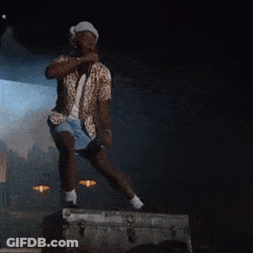 Man In Leopard Print Shirt Singing Into Microphone GIF
