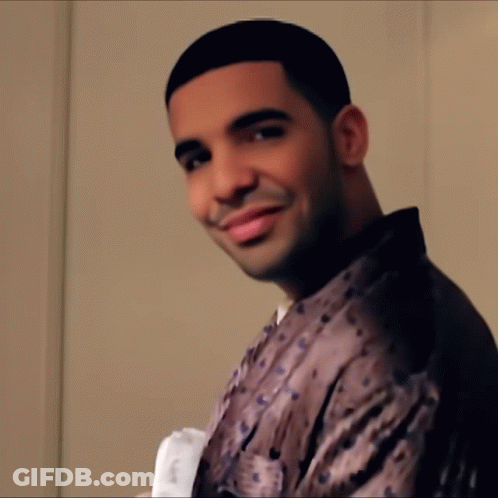 Man In Leopard Print Shirt Smiling At Camera GIF