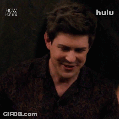 Man In Leopard Print Shirt Smiling Saying Cool GIF
