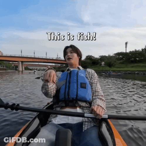 Man In Life Jacket Rowing Kayak Saying This Is Fish GIF