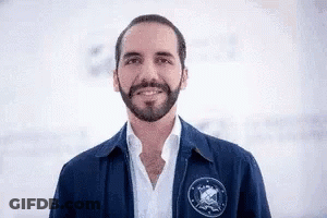 Man In Light Blue Shirt Making Funny Face GIF