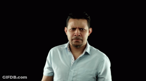 Man In Light Blue Shirt Smiling Dancing GIF