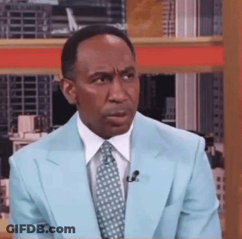 Man In Light Blue Suit With Microphone GIF