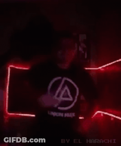 Man In Linkin Park Shirt In Green Light GIF