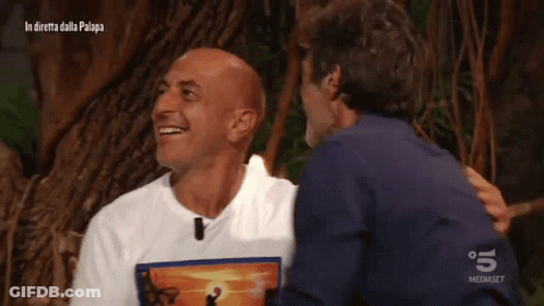 Man In Lion King T-Shirt Laughing With Another Man GIF