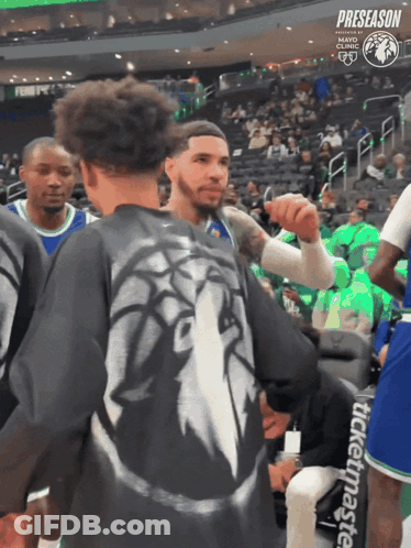 Man In Lion Shirt Talking To Another Man GIF