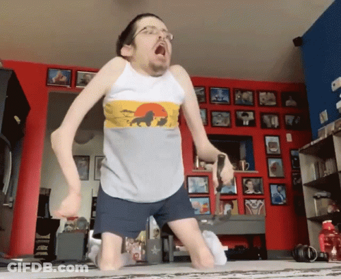 Man In Lion Tank Top Dancing GIF
