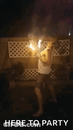 Man In Live Hat Beside Woman In Hood GIF