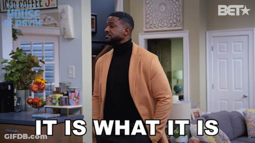 Man In Living Room Saying It Is What It Is GIF