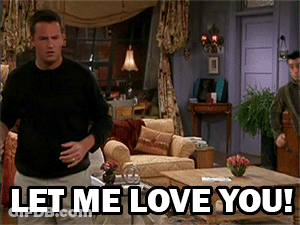 Man In Living Room Saying Let Me Love You GIF
