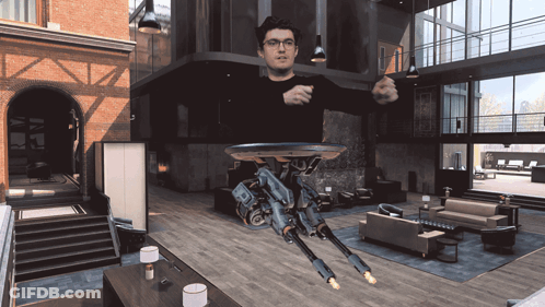 Man In Living Room With Flying Robot GIF