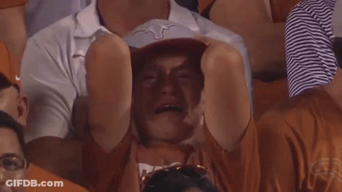 Man In Longhorn Hat Crying In Crowd GIF